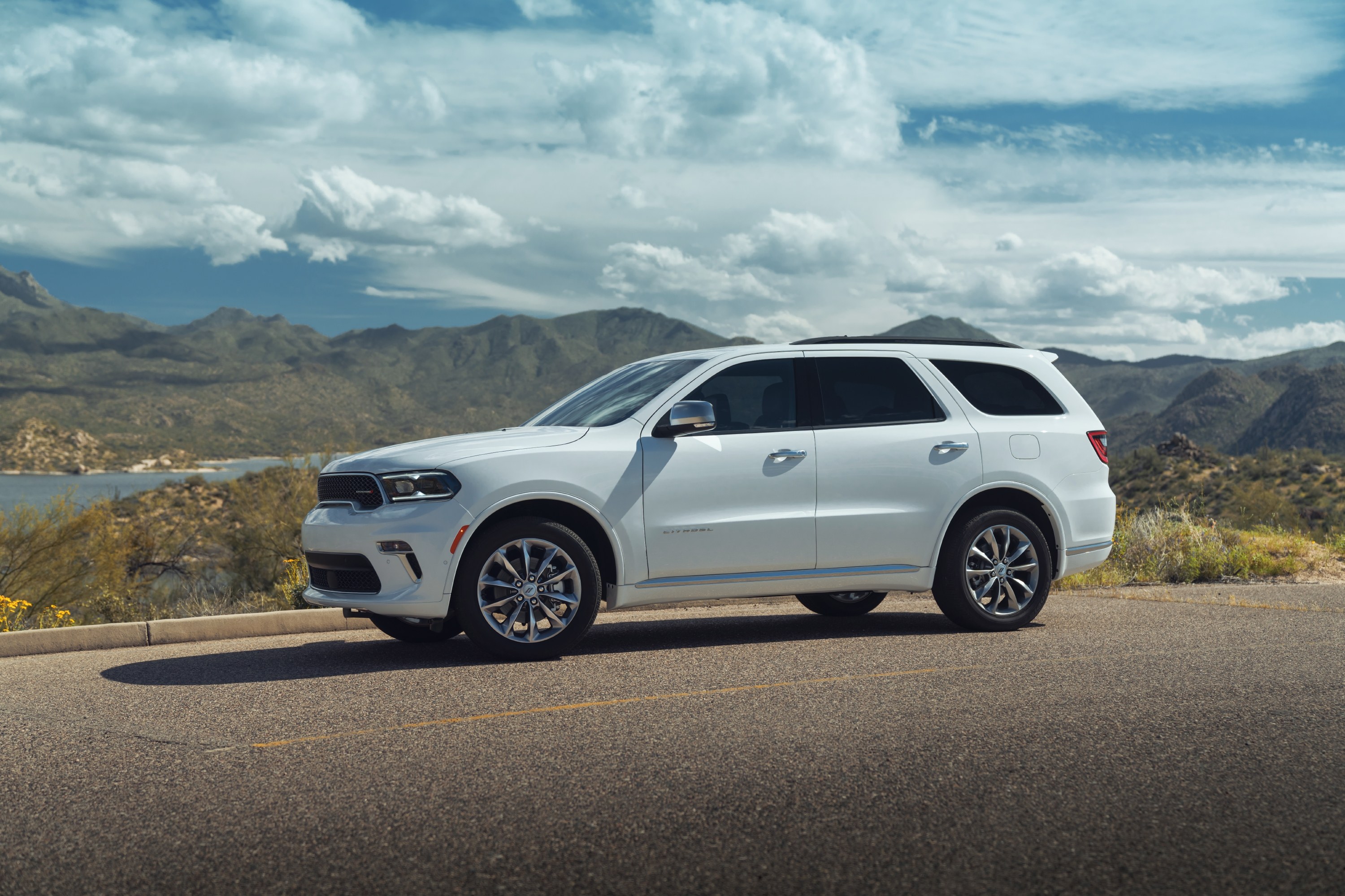 2023 Dodge Durango Citadel in white, front three-quarter view showing the liftgate roof spoiler covered by recall 26V528