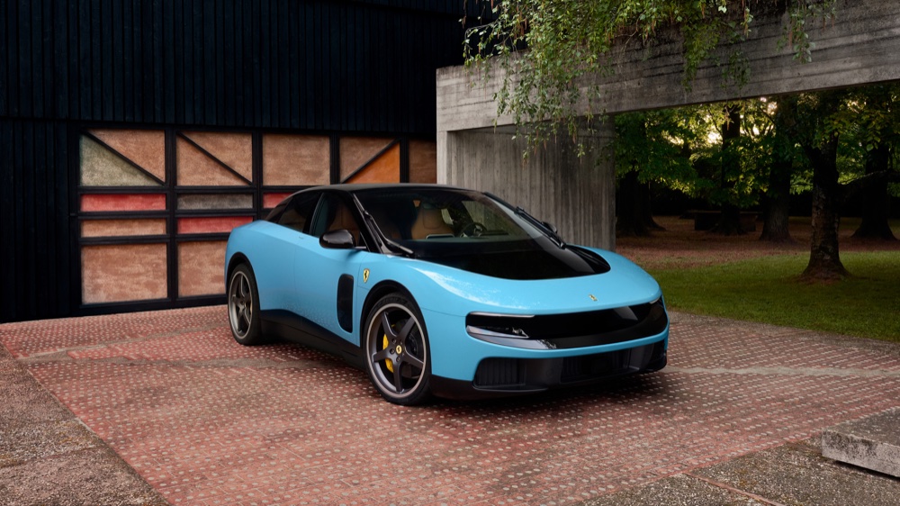 2026 Ferrari Luce front three-quarter view in Giallo Luce yellow, the first all-electric Ferrari production car