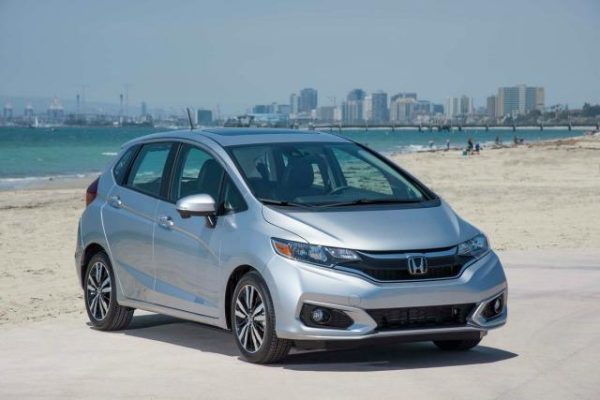 Two questions with similar themes percolate throughout the auto industry. Consumers want to know the best car for the money and the best car money can buy. The answers are subjective. But the first question is more relevant to more buyers, and so here’s one vote for the 2018 Honda Fit. Now in its third generation and 11th year since replacing the Honda Civic hatchback, the Fit is a five-door subcompact with more interior room than its appearance indicates. Versatile, well-constructed inside and outside and value-priced, the little engine that can is arguably the best new car available in the United States for less than $20,000. The 2018 Fit is available in LX, Sport, EX and EX-L trims. All Fits have 1.5-liter, four-cylinder engines with front-wheel drive. A standard six-speed manual or optional continuously variable transmission (CVT) is available except on EX-L trim. It only has a CVT. With a manual transmission, the engine is rated at 130 horsepower. The new Sport trim (my test vehicle) has a 7-inch touchscreen interface that connects with Apple CarPlay and Android Auto and a six-speaker sound system. A few new styling extras include 16-inch alloy wheels, foglights and a leather-wrapped steering wheel and shift knob. Also new for 2018 is an upgraded suspension and improved safety features. The Fit's interior space is impressive, including ample legroom in the back seat. Like many vehicles with manufacturer’s claims of five-passenger seating, the Fit is more appropriate for four adults. The second-row seating called “Magic Seat” is innovative. The 60/40-split rear bench folds flat into the floor, and the seat bottoms prop up to provide upright space for tall objects. With both rear seatbacks folded down, the Fit has 52.7 cubic feet of cargo room, not too much less than some smaller crossovers and the best in its segment. With the Fit's front passenger seat folded flat, items nearly eight-feet long will fit. The Honda Fit shouldn’t be expected to break land speed records. But for its class, it’s no slouch. Its 0-60 mph test speed of 8.8 seconds is among the strongest in its segment. Gas mileage averages are 29 miles per gallon in city driving, 36 miles per gallon on the freeway. On the open road, the Honda Fit drives predictably. It’s a lightweight vehicle, so it doesn’t have a lot of authority. And compared to previous years’ models, the new Fit has more engine noise at freeway speeds. With three two friends and a combined occupant weight of about 550 pounds, the new Fit fared well and without issues on a 275-mile round-trip from Sacramento to Half Moon Bay. The engine's high pitch is prevalent, particularly exceeding 70 miles per hour. But it's not problematic. Still, the Fit is at its best in city driving. It maneuvers well through traffic, has a tight turning radius and is confident, as it should be, in tight parking spaces. Overall road vision is impressive, in part because the Fit has 10 windows. It’s another reason why the Fit has a larger presence than its subcompact status. The manufacturer's suggested retail price (MSRP) for the top-line EX-L model just surpasses $20,000, but the remaining fit trims are all less expensive. The MSRP for the Sport model is $17,500. With its delivery charge, the total is $18,390. The topic of best car money can buy is still open for discussion as is the best car for the money. But the 2018 Honda Fit makes its case just as it has for the past decade.