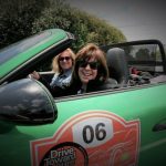 Deb Pollack (driving) is the founder of Drive Toward A Cure.