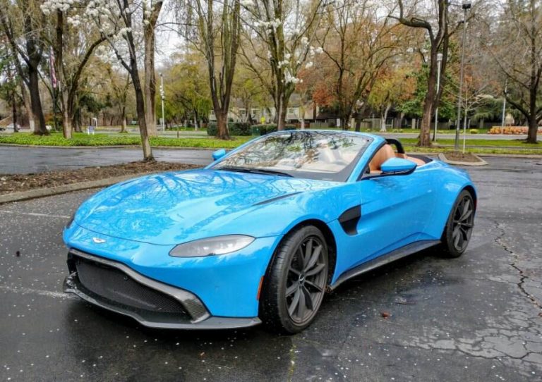 The 2021 Aston Martin Vantage attracts attention with combine blue exterior and tan interior.