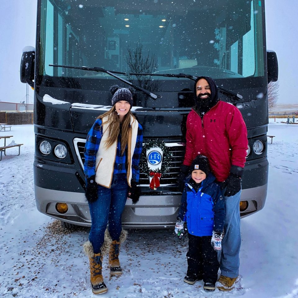 The Adventurunity Family on the road in the winter.