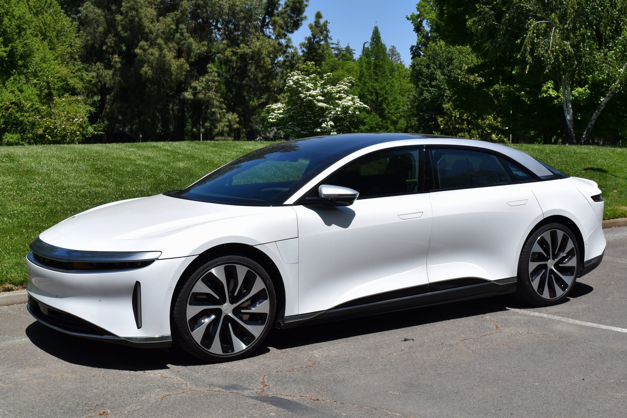 Recessed door handles and glass canopy-style roof are among the Lucid Air design highlights.