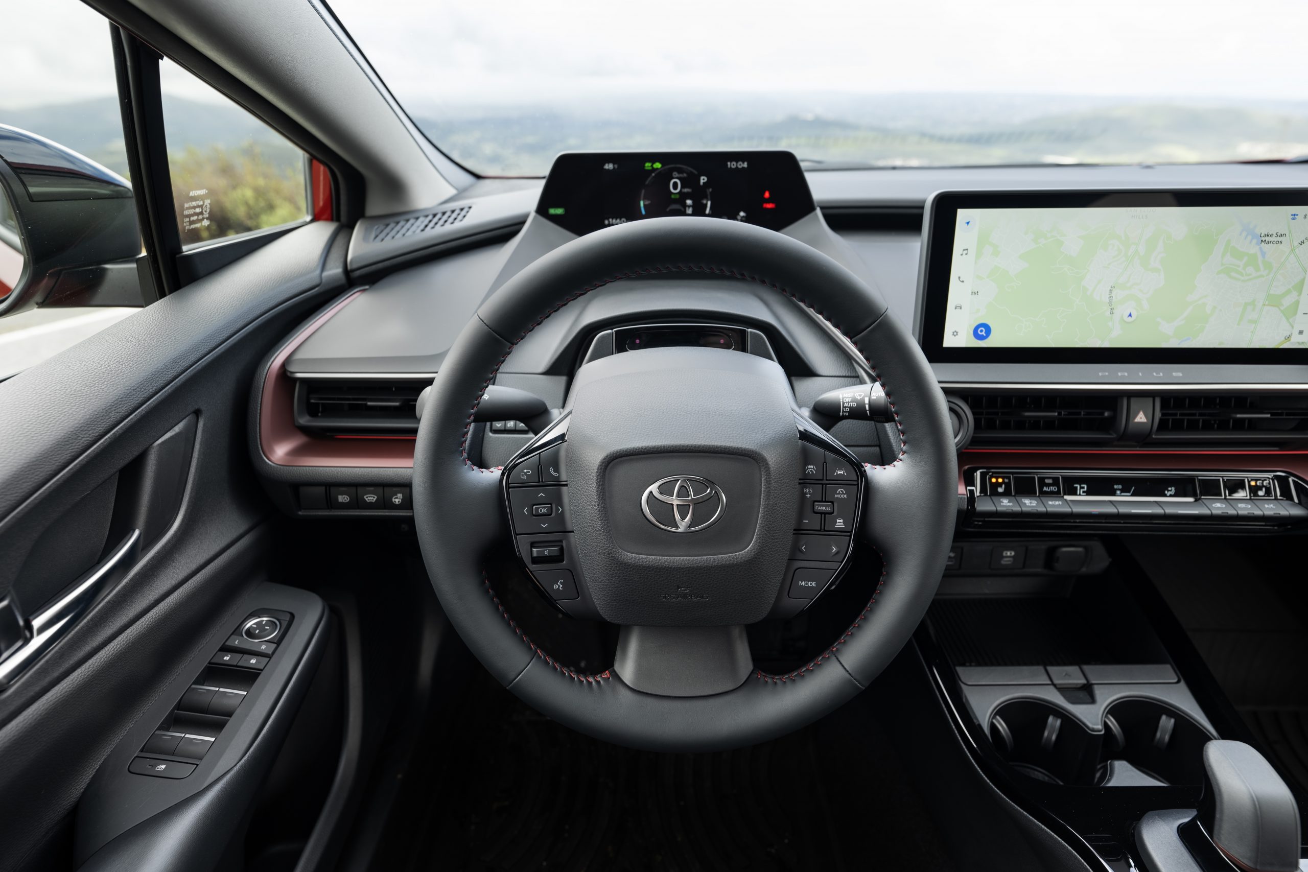 The 2023 Toyota Prius Prime dashboard and steering wheel