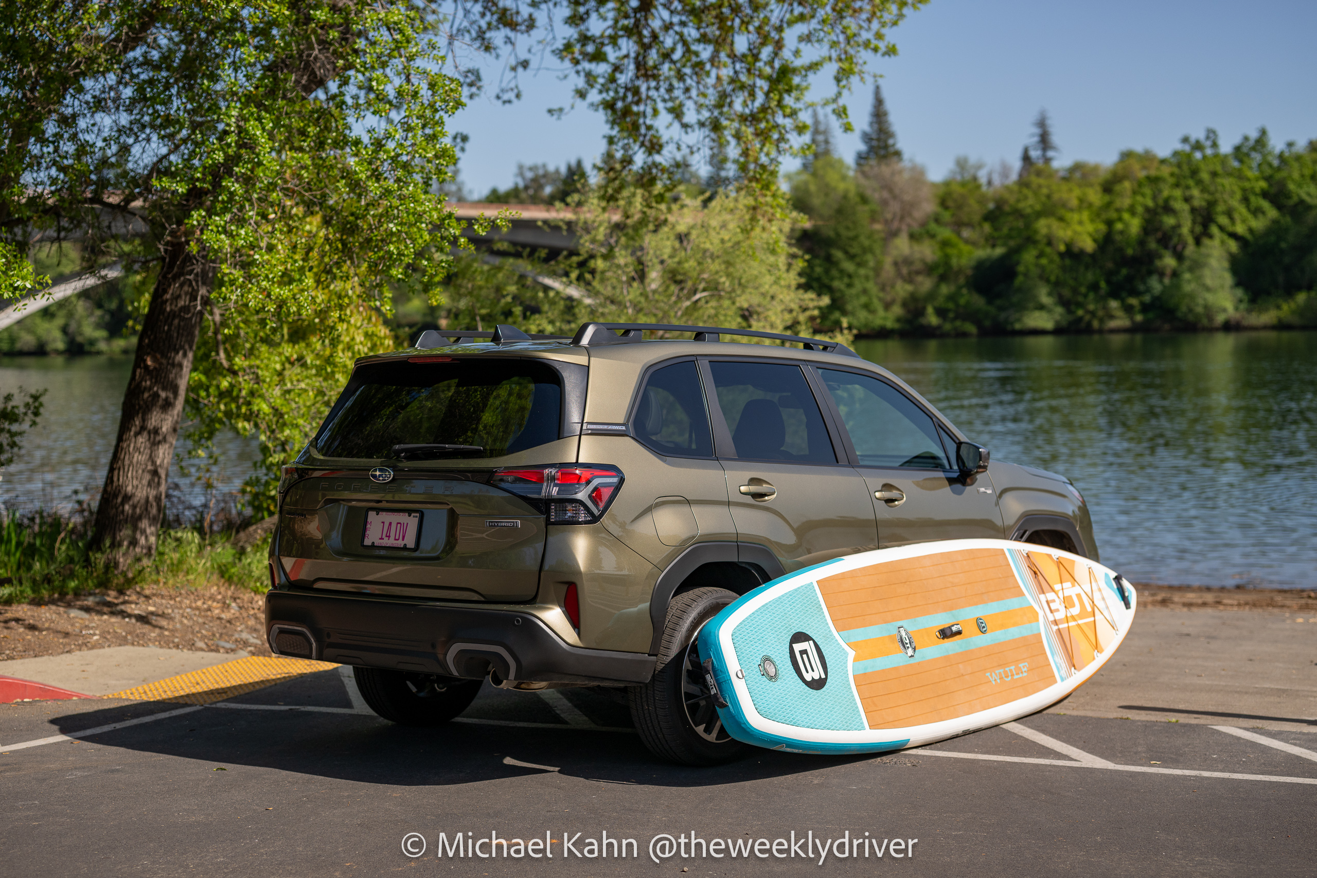 2025 Subaru Forester Limited Hybrid paddle board lake