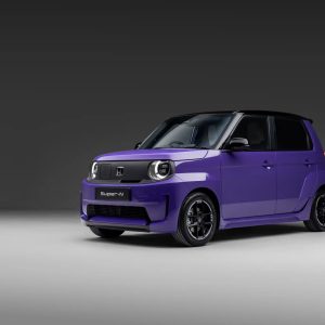 2026 Honda Super-N front three-quarter view showing flared wheelarches, 15-inch alloy wheels, and retro-inspired City Turbo styling