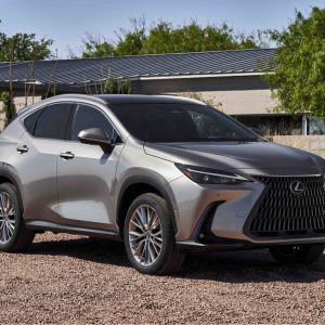 2026 Lexus NX 450h+ Premium AWD front three-quarter exterior view in champagne