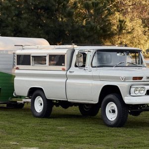 1963 GMC K1000 4x4 in Pearl Grey with 1960 Shasta Compact camper trailer, side view