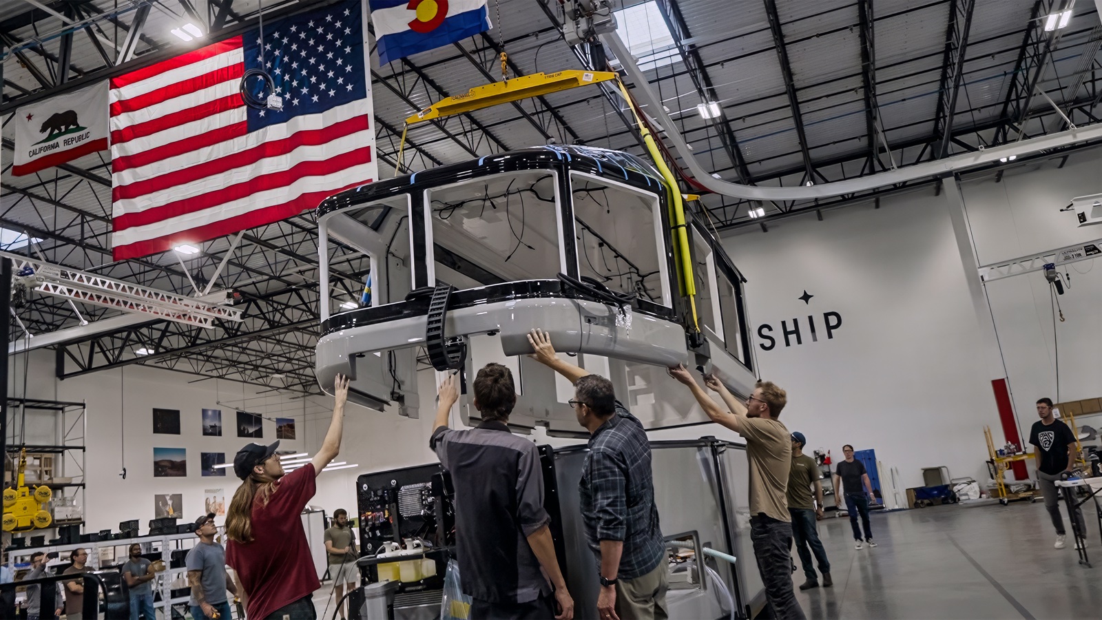 Lightship manufacturing floor in Broomfield, Colorado with AE.1 trailers in various assembly stages