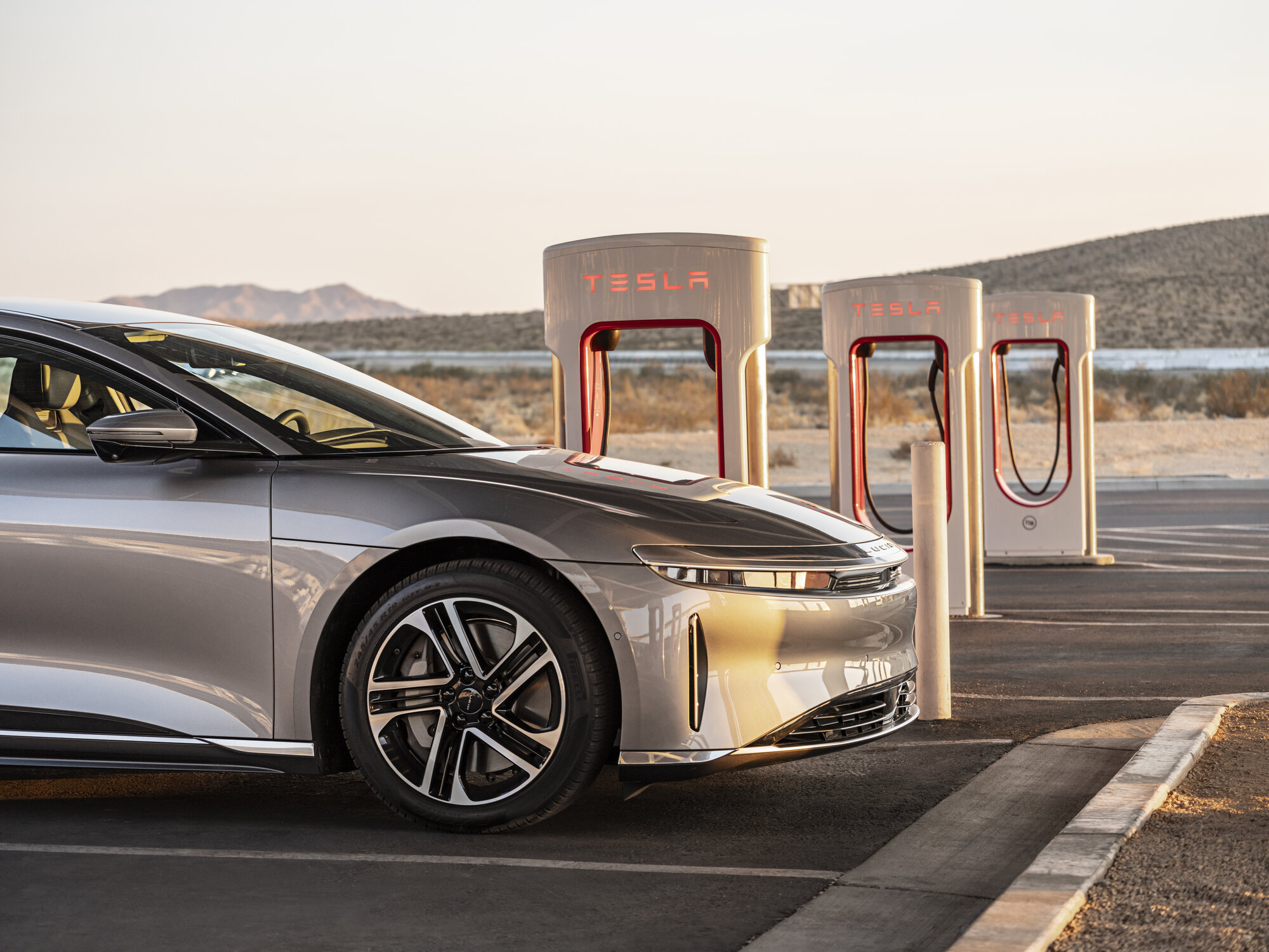 Lucid Air charging at Tesla Supercharger