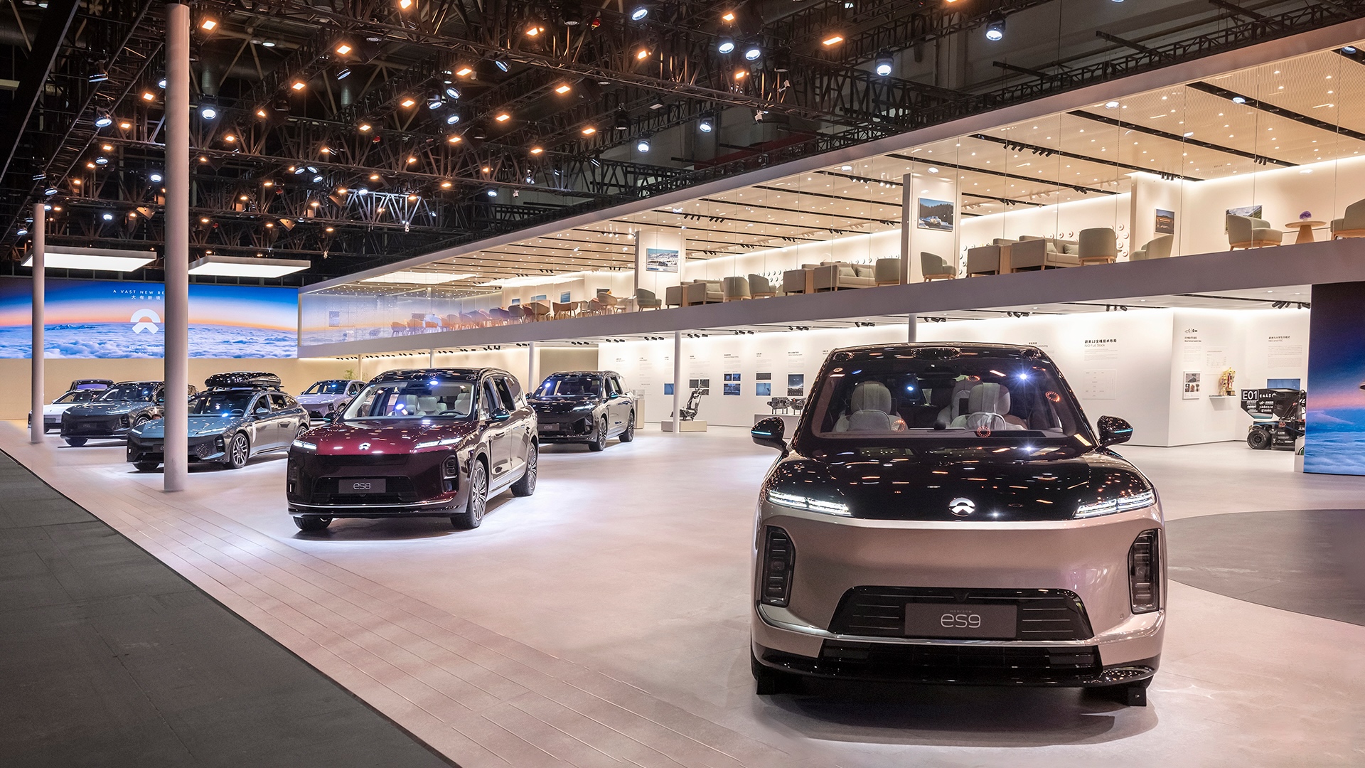 Nio's three brands (Nio, Onvo, Firefly) on display at Auto China 2026 with 11 models under one booth, the first time the company has presented all three together at a major auto show