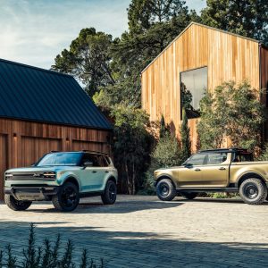 Scout Traveler SUV and Scout Terra pickup shown side by side at the 2024 reveal