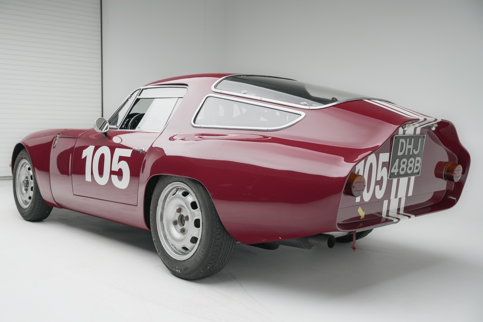 1964 Alfa Romeo Giulia TZ rear three-quarter view showing the Zagato coda tronca short tail body and race number 105