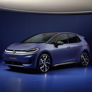 2026 Volkswagen ID.3 Neo front three-quarter view in studio showing new LED light bar and Pure Positive design language
