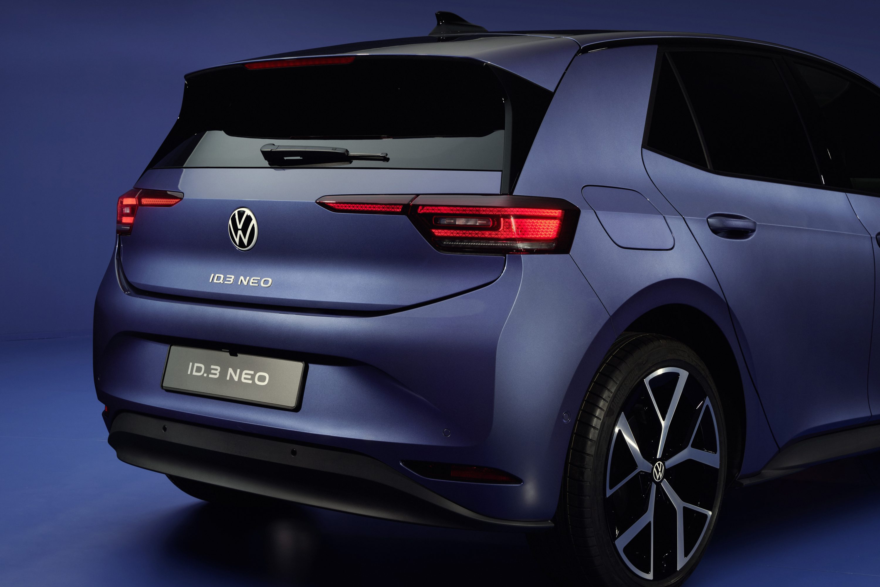 2026 Volkswagen ID.3 Neo rear three-quarter view showing body-color roof and updated taillight design
