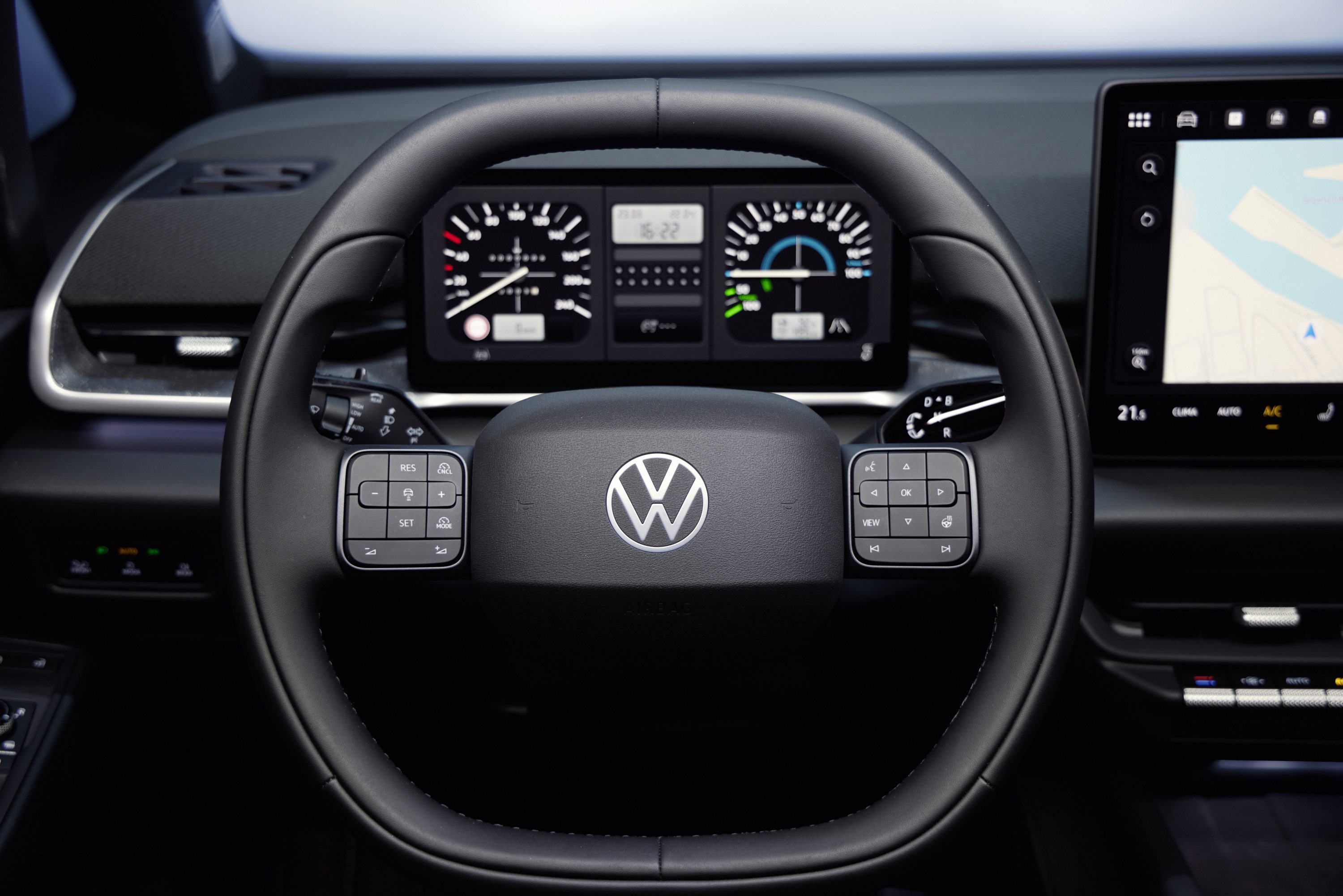 2026 Volkswagen ID.3 Neo steering wheel and digital instrument cluster closeup showing new multifunction buttons