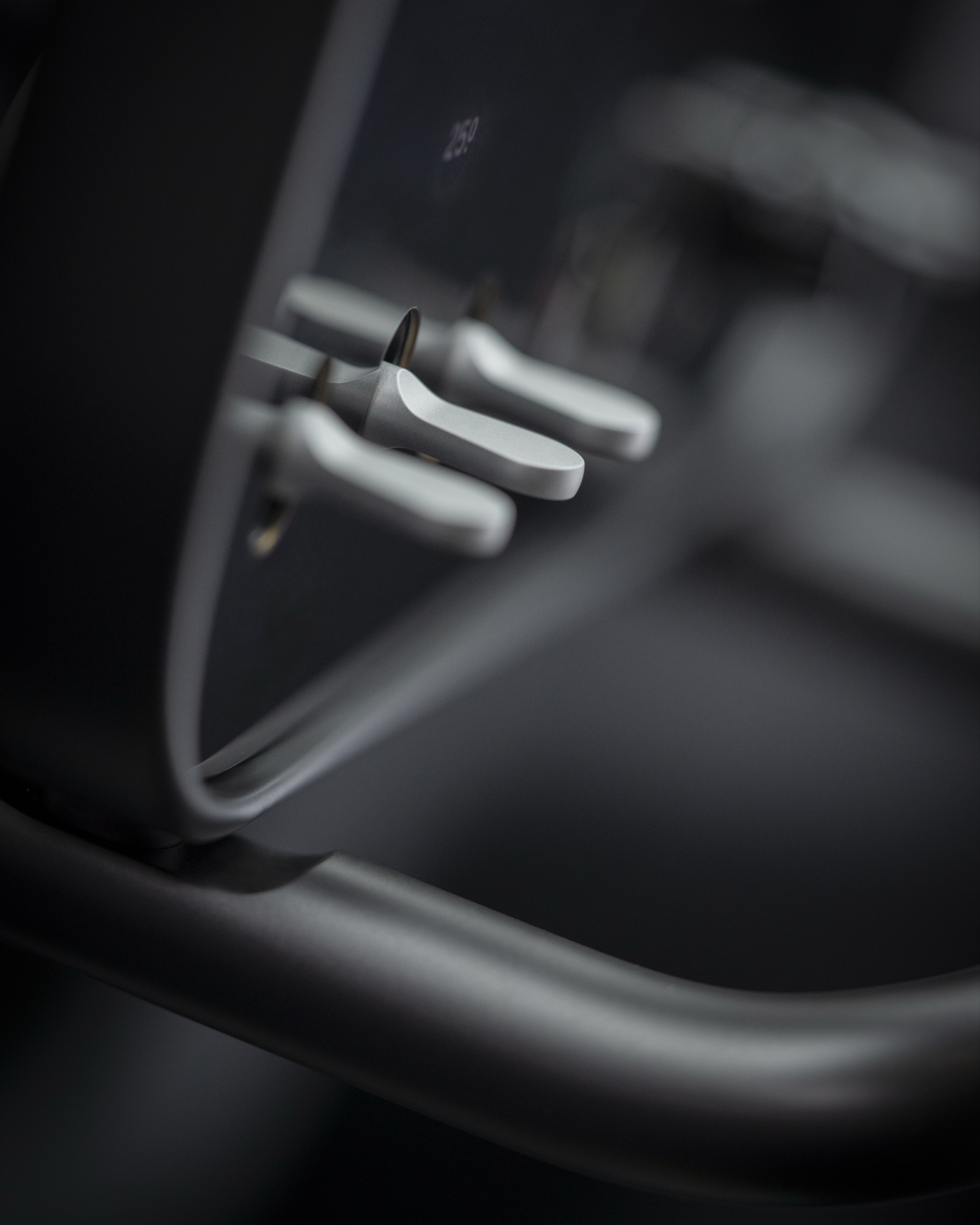 2026 Ferrari Luce torque-control paddles machined from anodized aluminum, debuting Ferrari's Torque Shift Engagement system