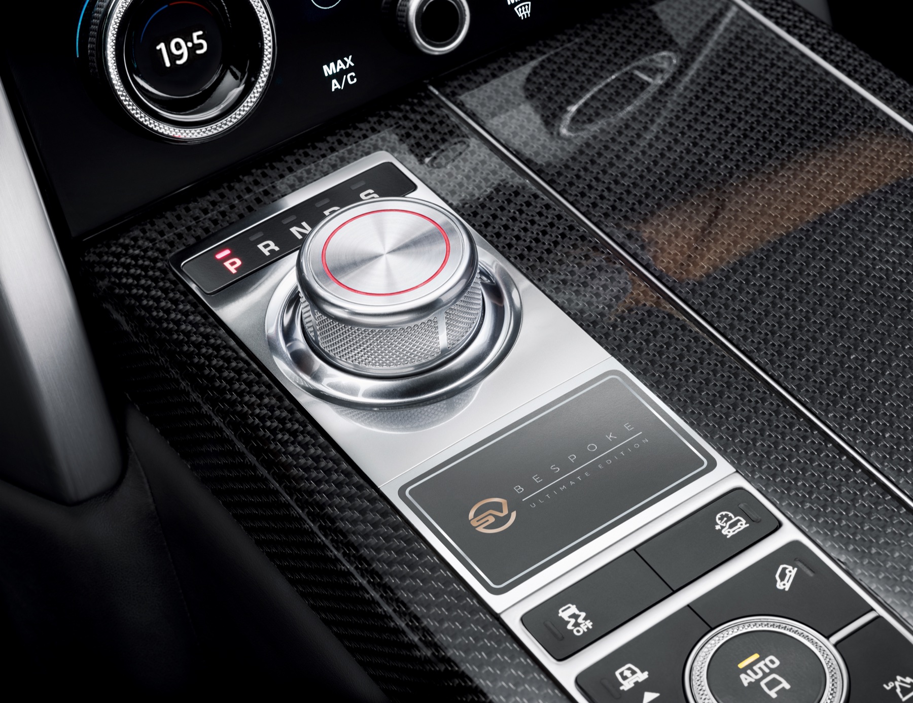 2021 Range Rover SV Autobiography Ultimate Edition badge plaque close-up, hand-finished metal with bespoke serial markings, illustrating the badge-tier exclusivity argument
