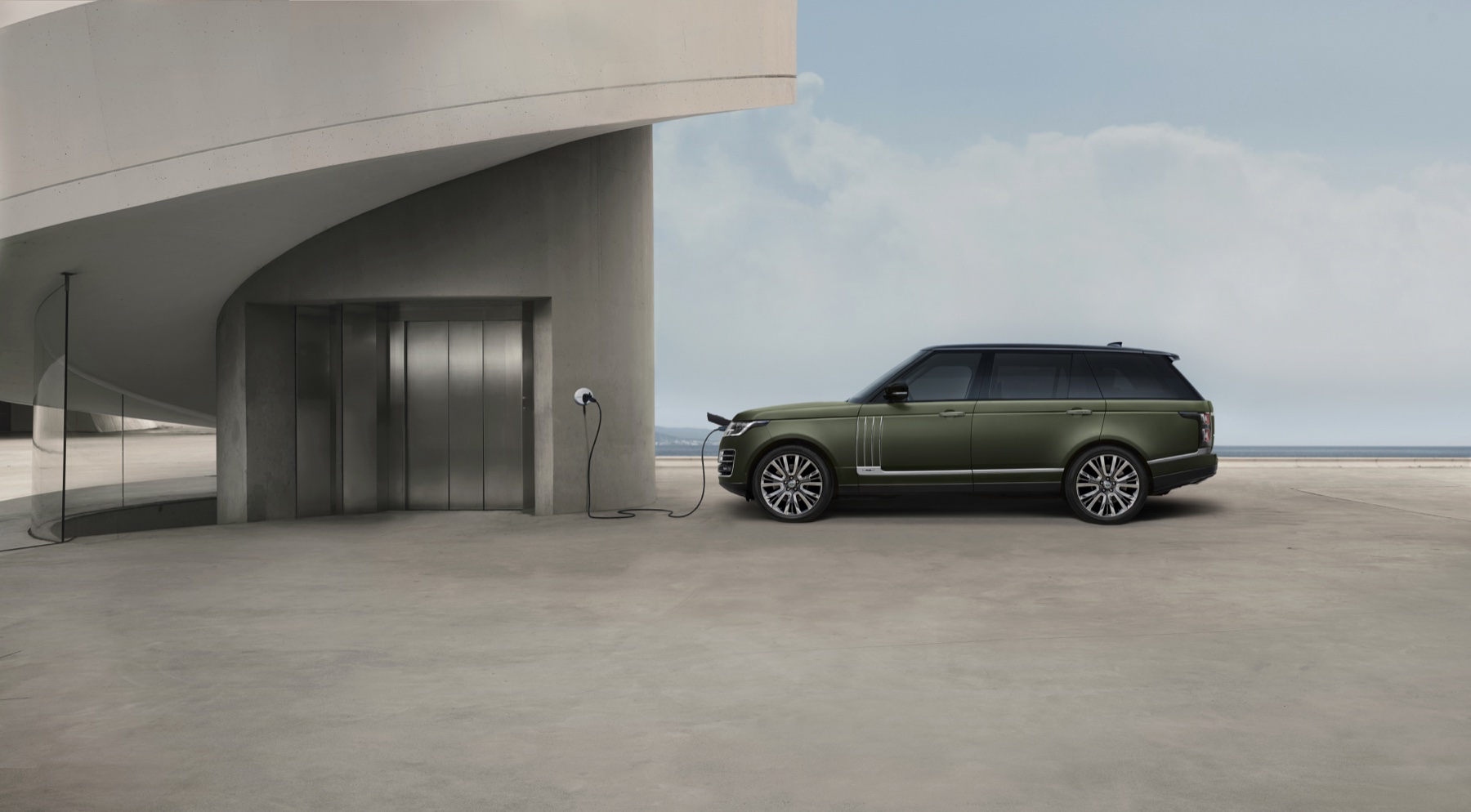 2021 Range Rover SV Autobiography Ultimate Edition in PHEV configuration, side profile, illustrating the plug-in hybrid powertrain that sits between the P400 and P530 on price
