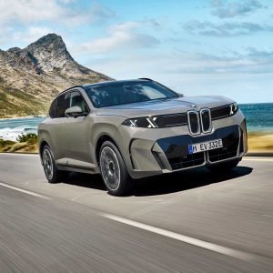New-generation BMW X5 driving on a coastal road, the body the iX5 Hydrogen will share when production starts in 2028
