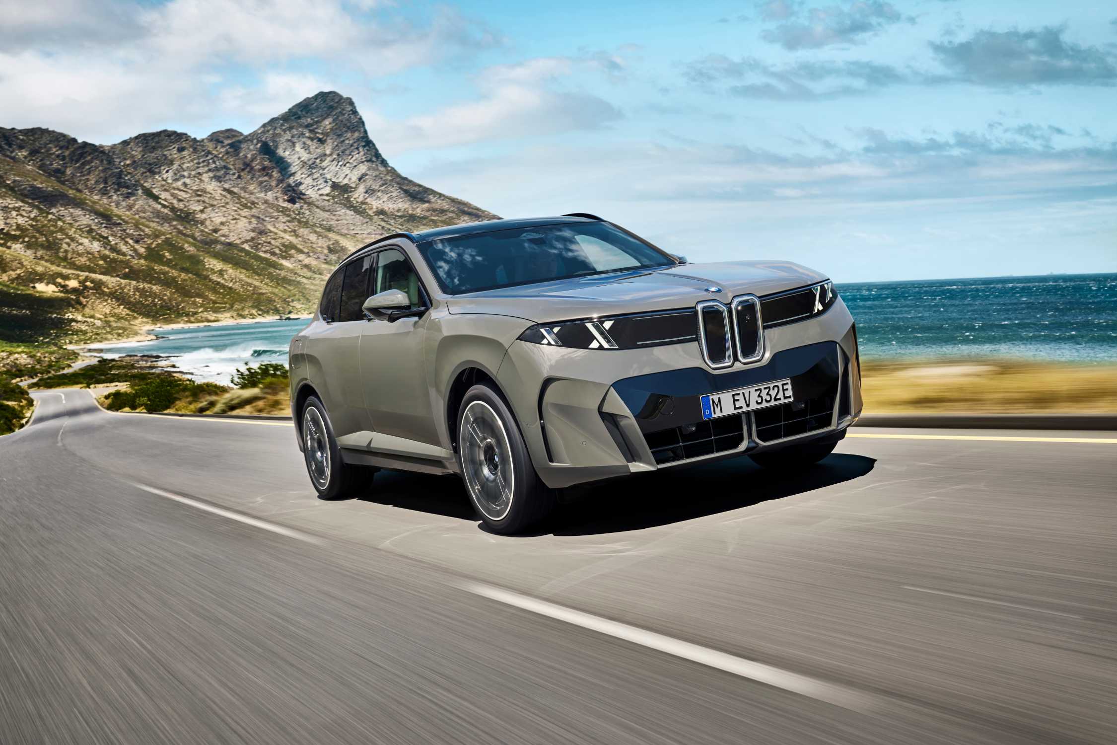 BMW's Hydrogen X5 Is Coming in 2028. America Has 47 Places to Fill It 1 New-generation BMW X5 driving on a coastal road, the body the iX5 Hydrogen will share when production starts in 2028