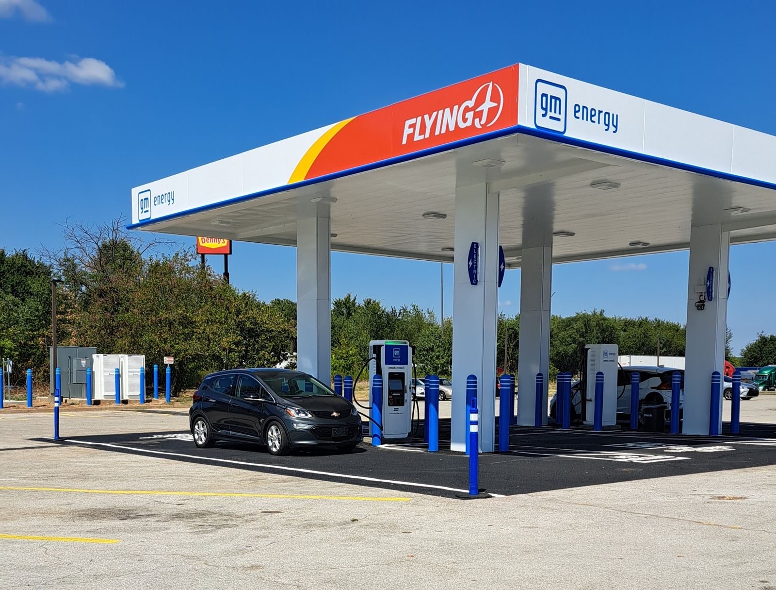 Chevrolet Bolt EV DC fast charging at a GM Energy station, one of the strong battery-retention used EVs