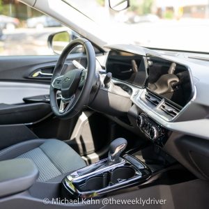 2026 Chevrolet Trax 1LT interior with 11-inch touchscreen and Jet Black trim with blue accents