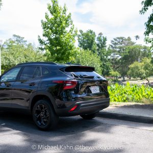 2026 Chevrolet Trax 1LT in Mosaic Black Metallic, rear three-quarter view