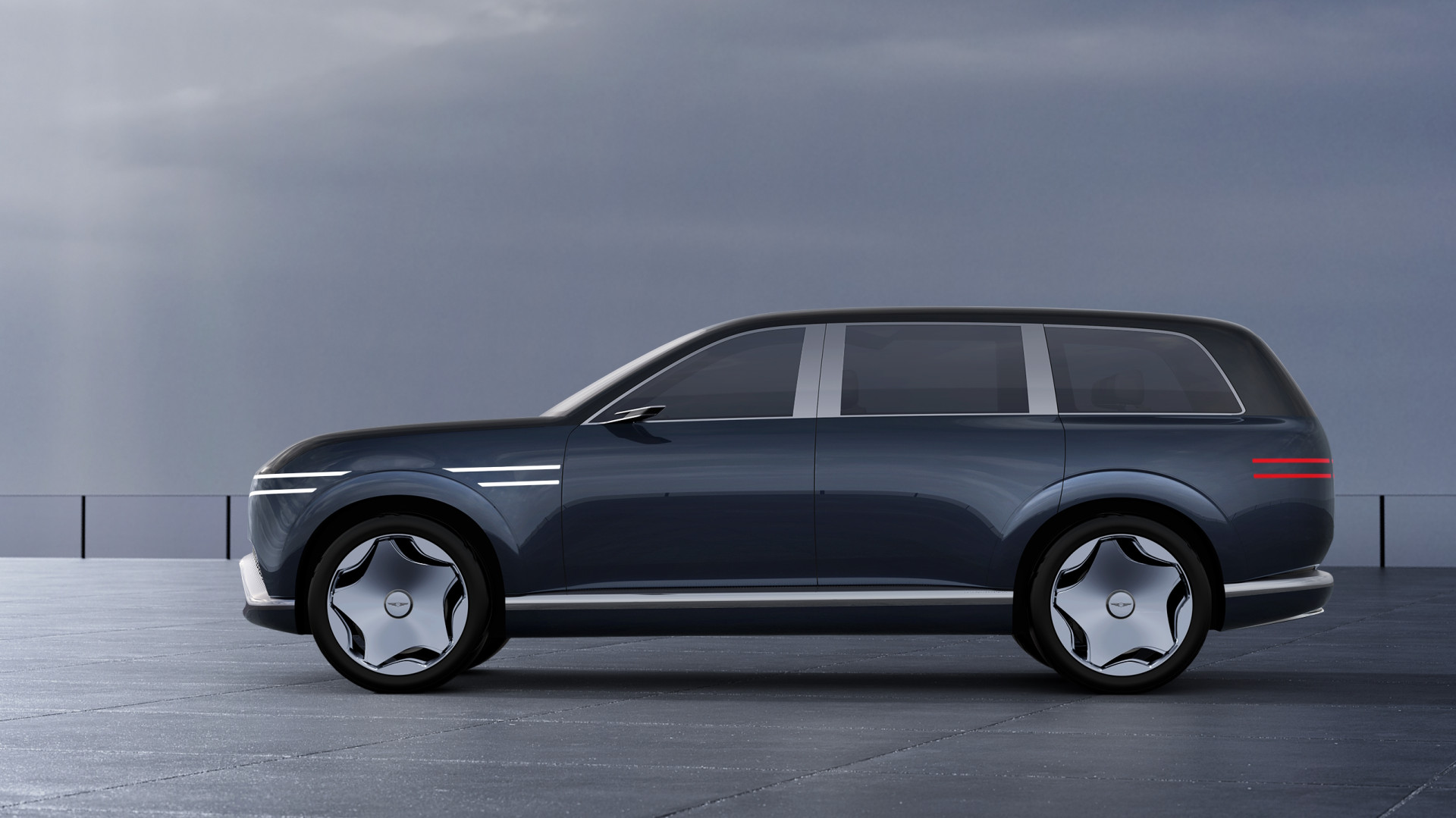 The Genesis Neolun concept in profile, showing its pillarless glass and long full-size SUV proportions