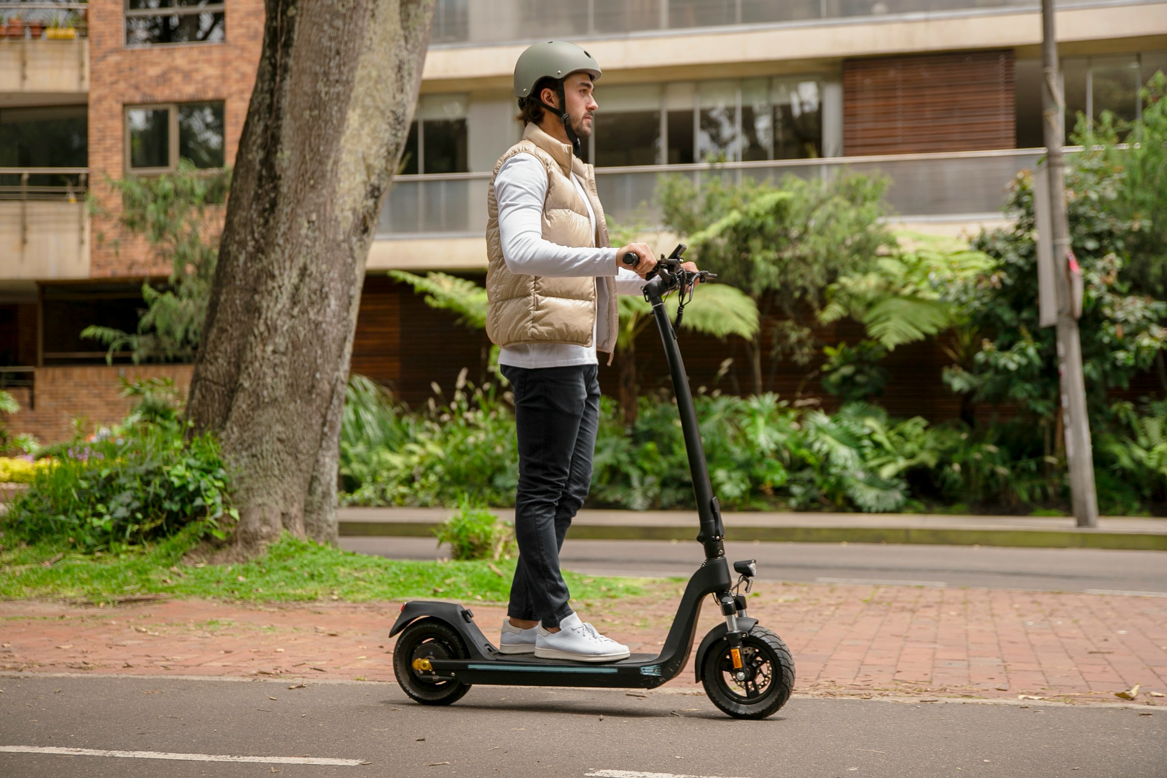 How Parking Garage Exits Become One of the Biggest Threats to Scooter Riders on Busy City Streets