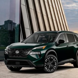 A 2026 Nissan Rogue in dark green, front three-quarter view, the current version of the generation covered by three VC-Turbo engine recalls