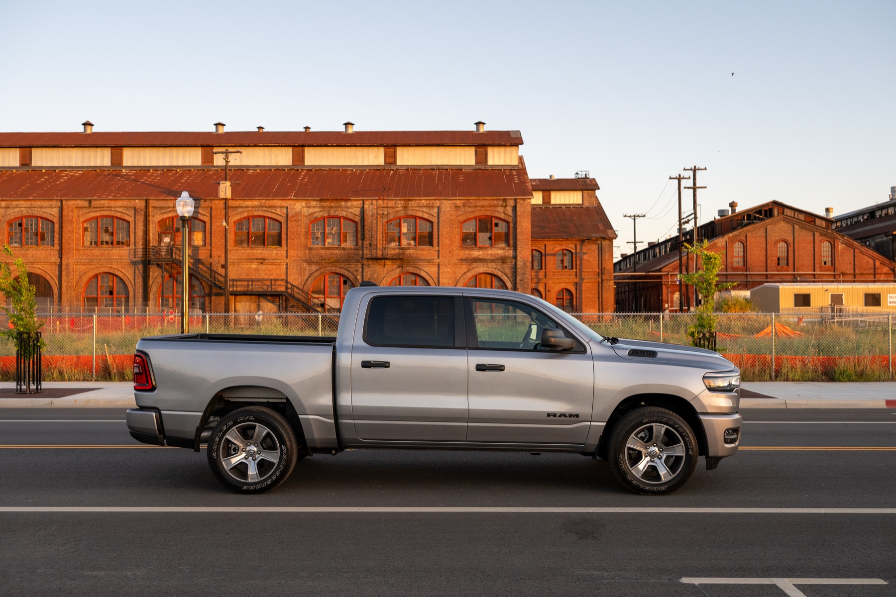 2026 RAM 1500 Express Billet Silver: Side profile at golden hour