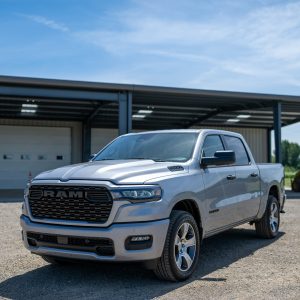 Comparison of 2026 RAM 1500 engine options: 3.0L Hurricane inline-six and 5.7L Hemi V8