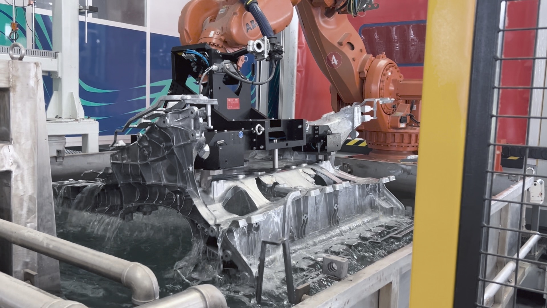 Robotic handling of a large aluminum unicasting on Ford's Universal EV production system at Louisville Assembly Plant