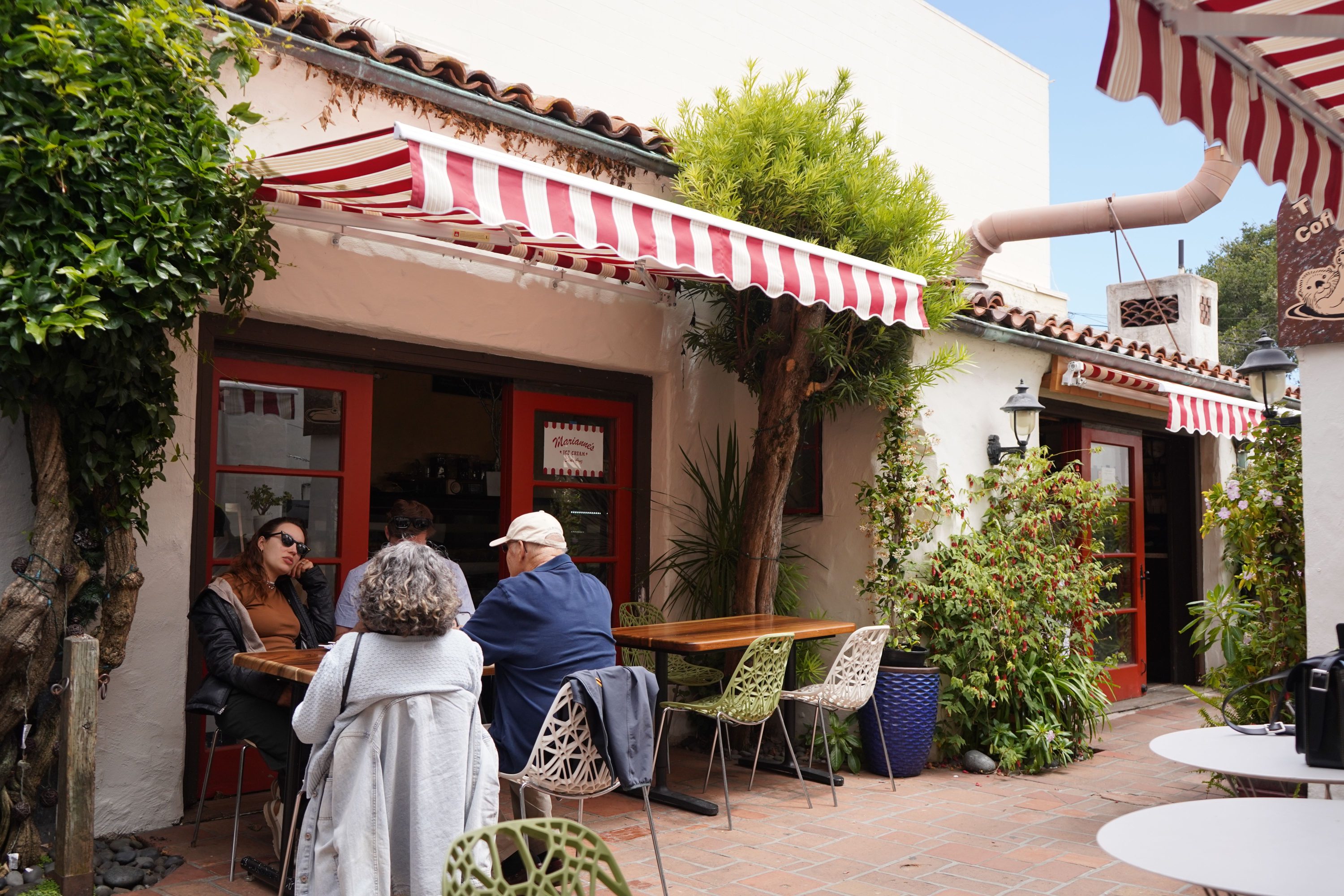 Outdoor cafe with awnings on a street in Carmel-by-the-Sea, California