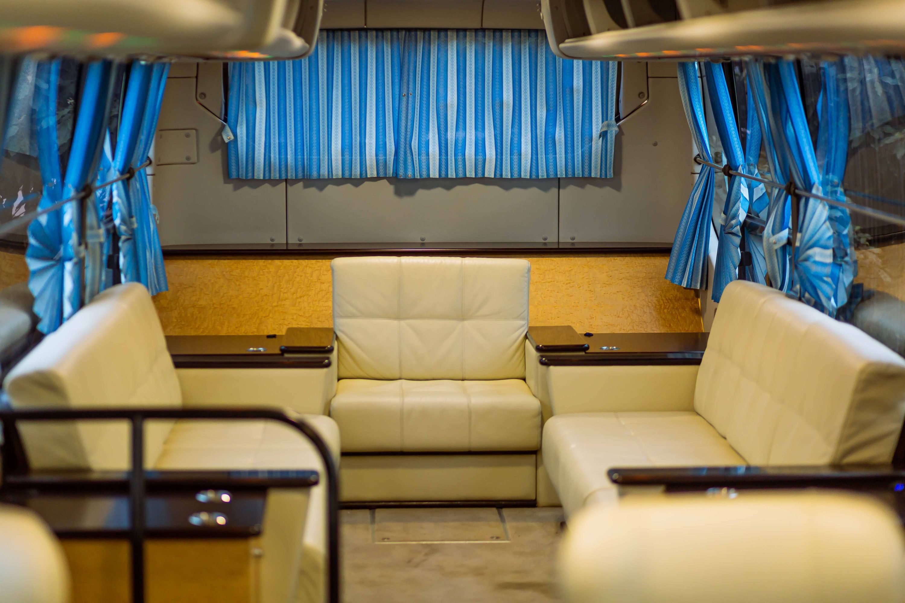 Spacious luxury coach interior with leather seats