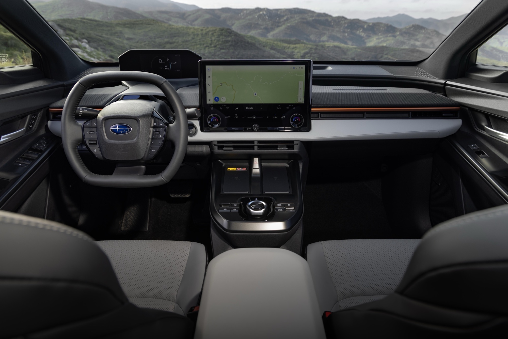 Interior of the 2026 Subaru Uncharted showing the touchscreen, steering wheel and grey upholstery