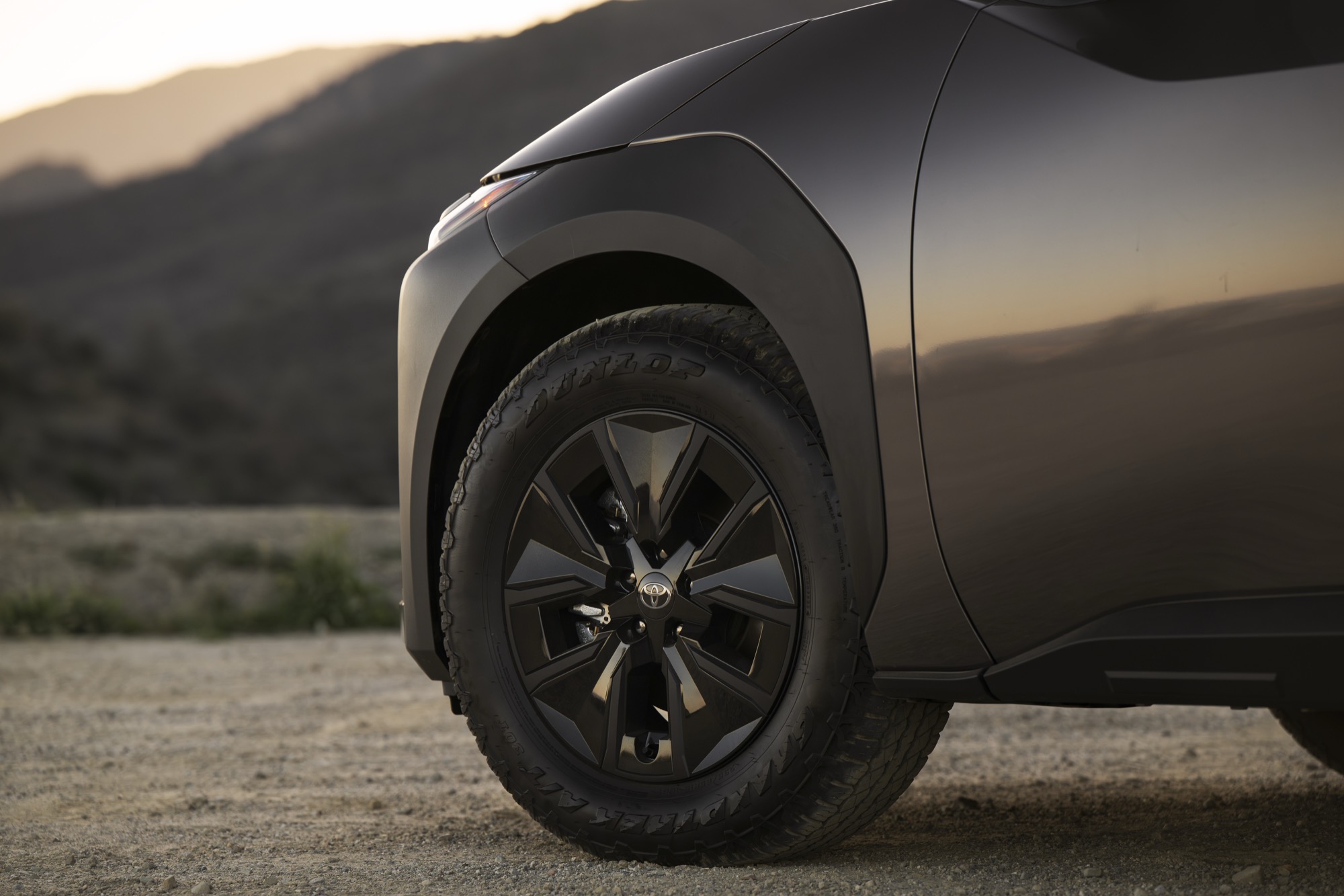Close-up of a black 18-inch alloy wheel and tire on a 2026 Toyota bZ Woodland