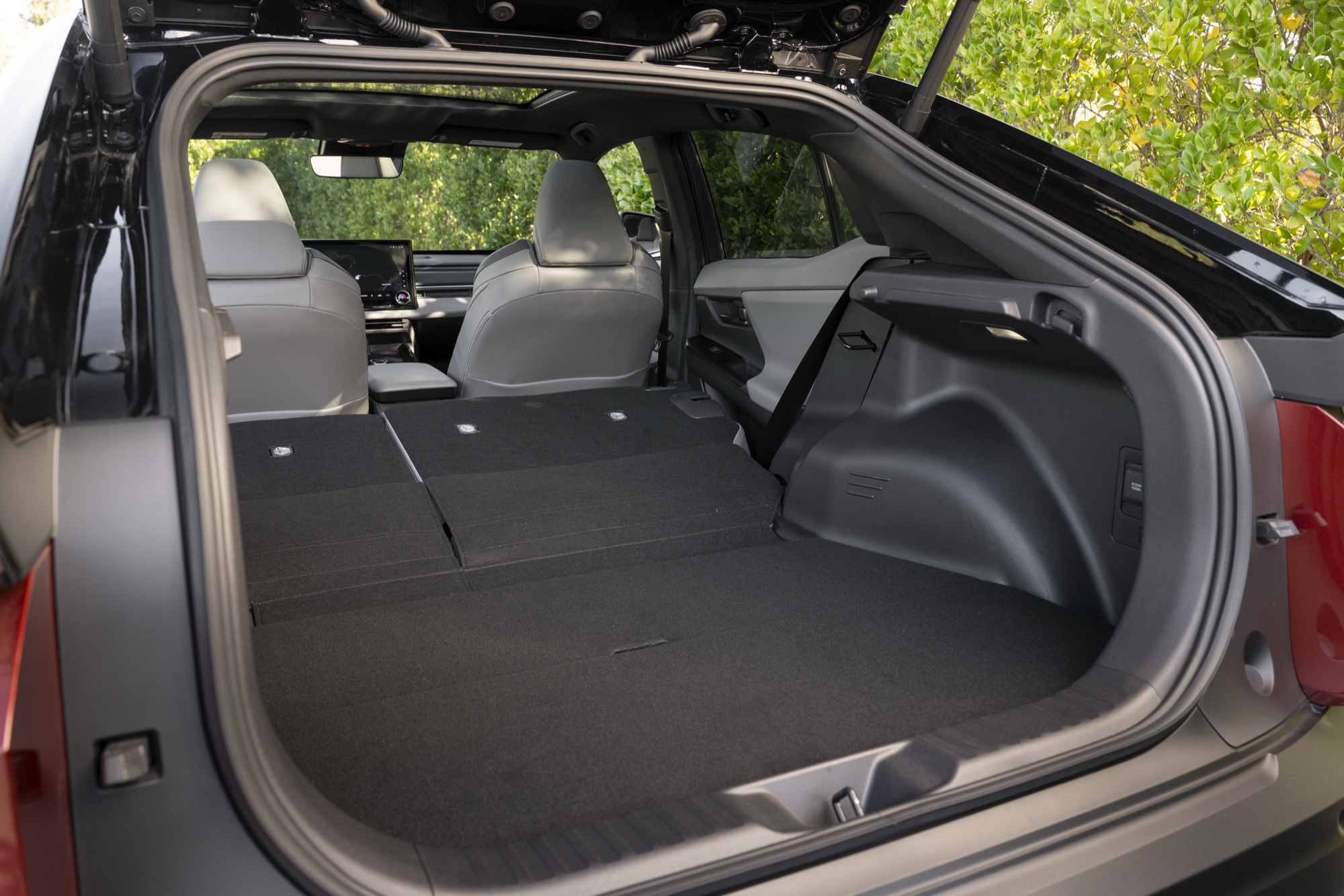 Cargo area of the 2026 Toyota C-HR BEV with the rear seats folded flat