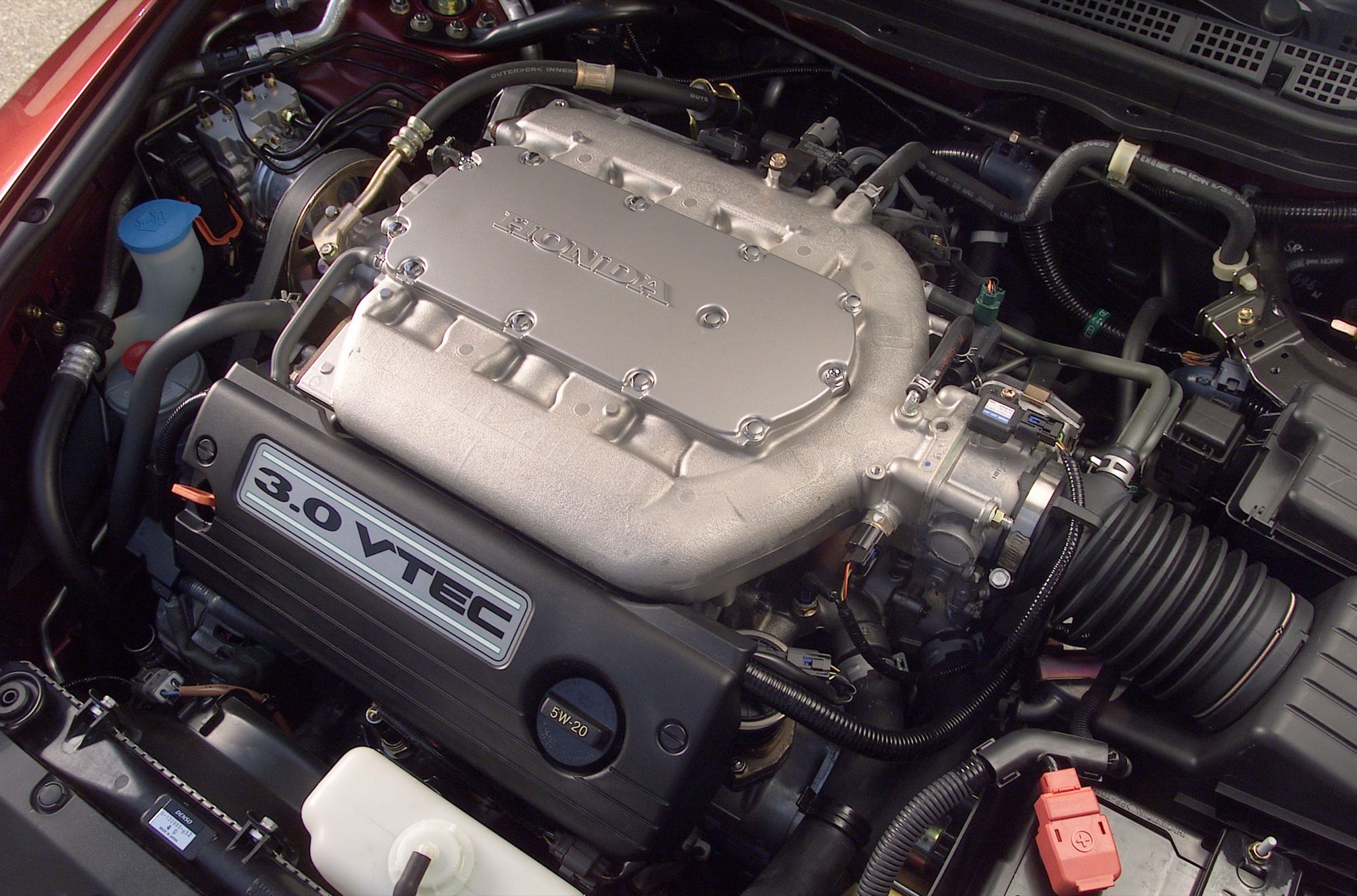 3.0-liter VTEC V6 engine under the hood of a 2004 Honda Accord