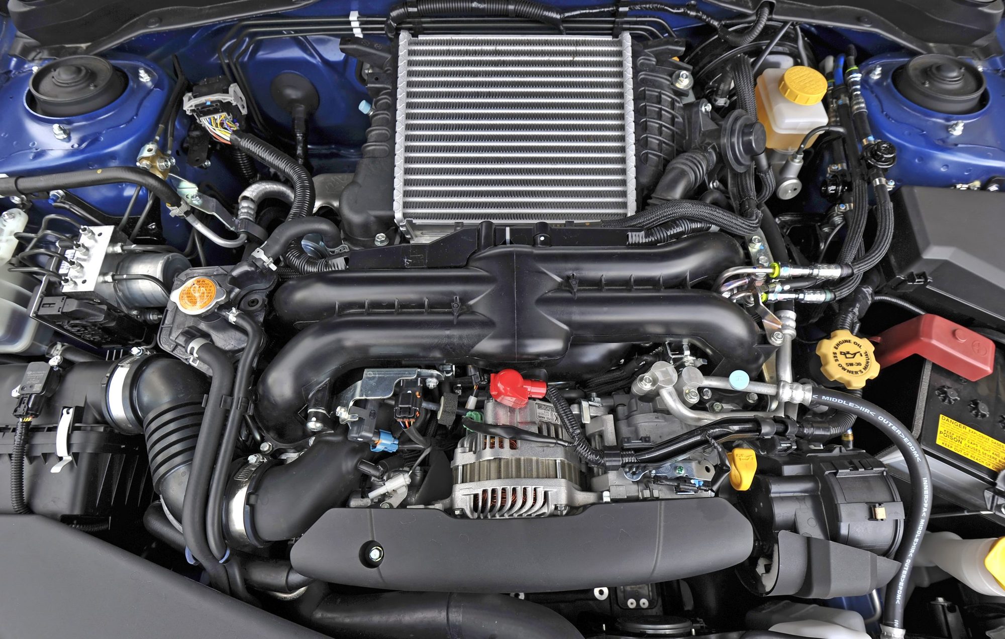 Turbocharged 2.5-liter boxer engine with top-mounted intercooler in the 2011 Subaru Impreza WRX
