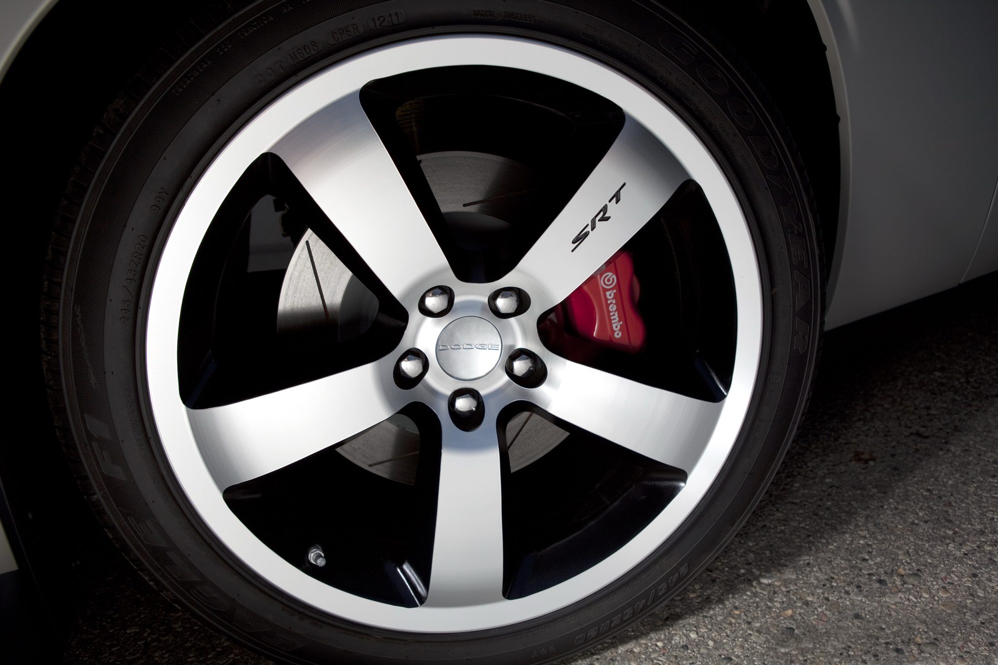 SRT five-spoke wheel and red Brembo brake caliper on the 2012 Dodge Challenger SRT8 392