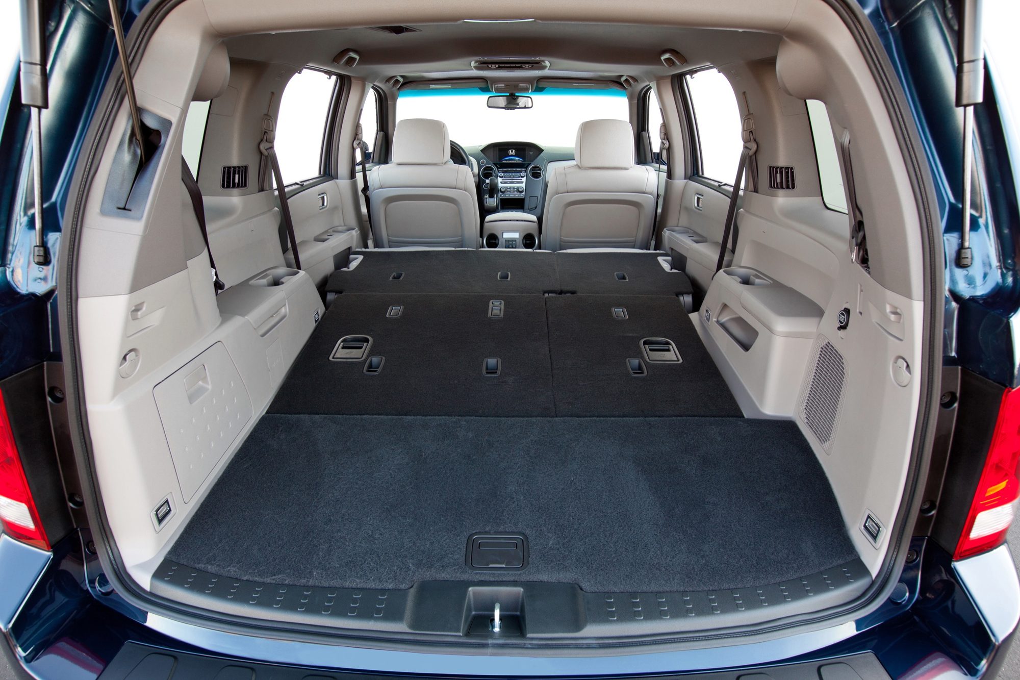 Cargo area of the 2012 Honda Pilot Touring with the second and third rows folded flat