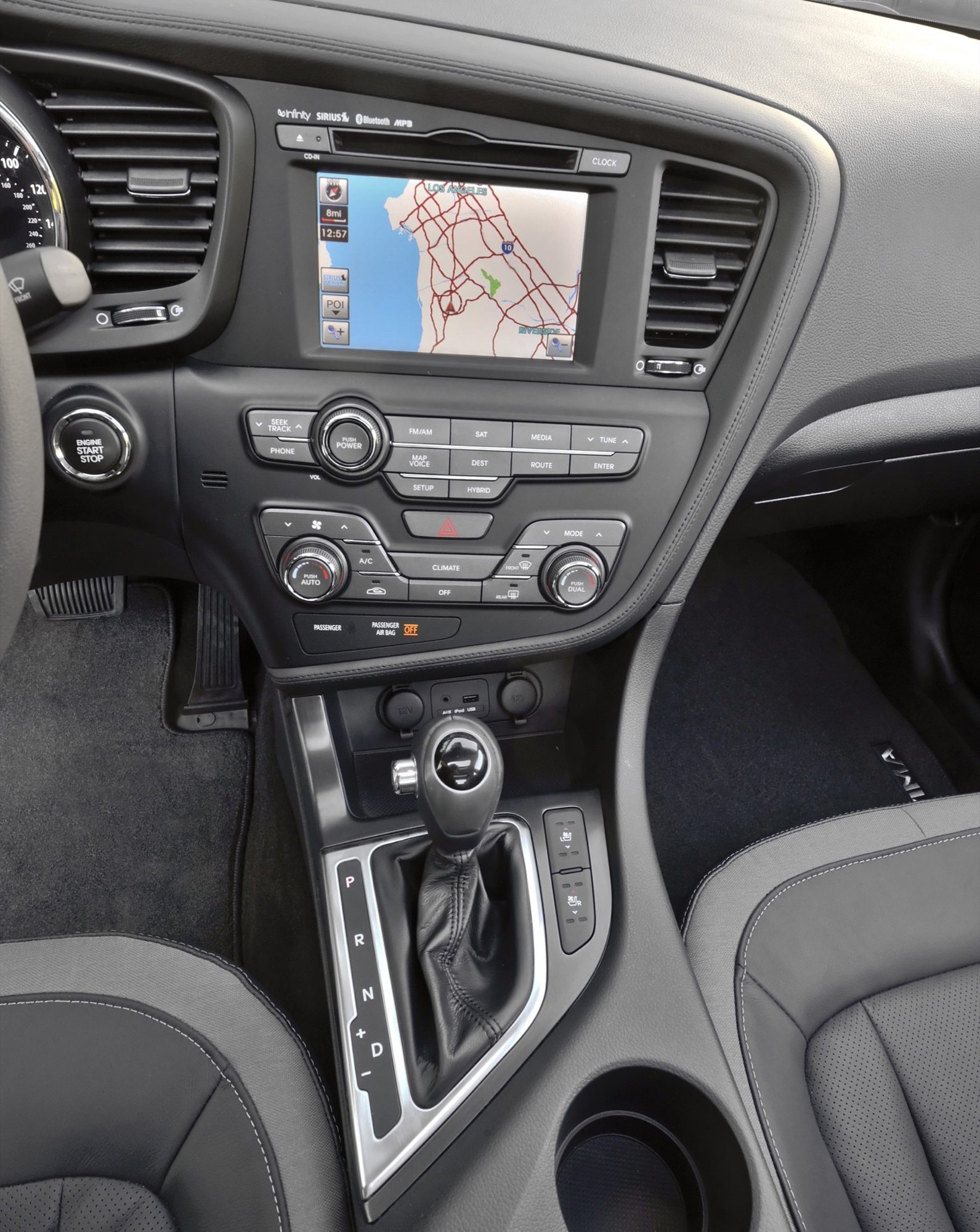 Navigation screen, climate controls and shifter in the 2012 Kia Optima Hybrid