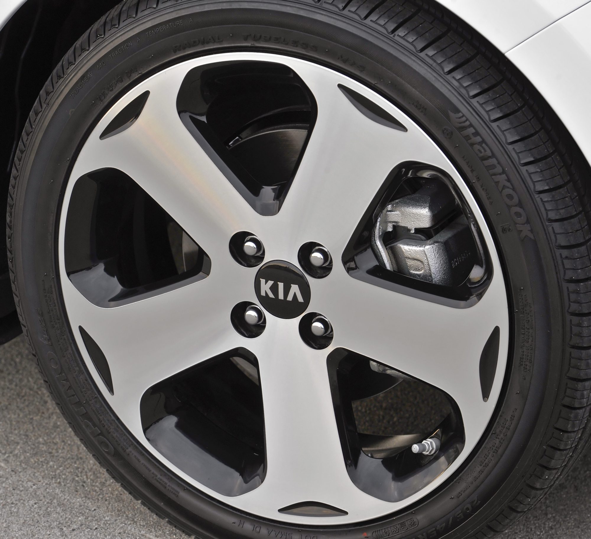 17-inch five-spoke alloy wheel on a 2012 Kia Rio SX