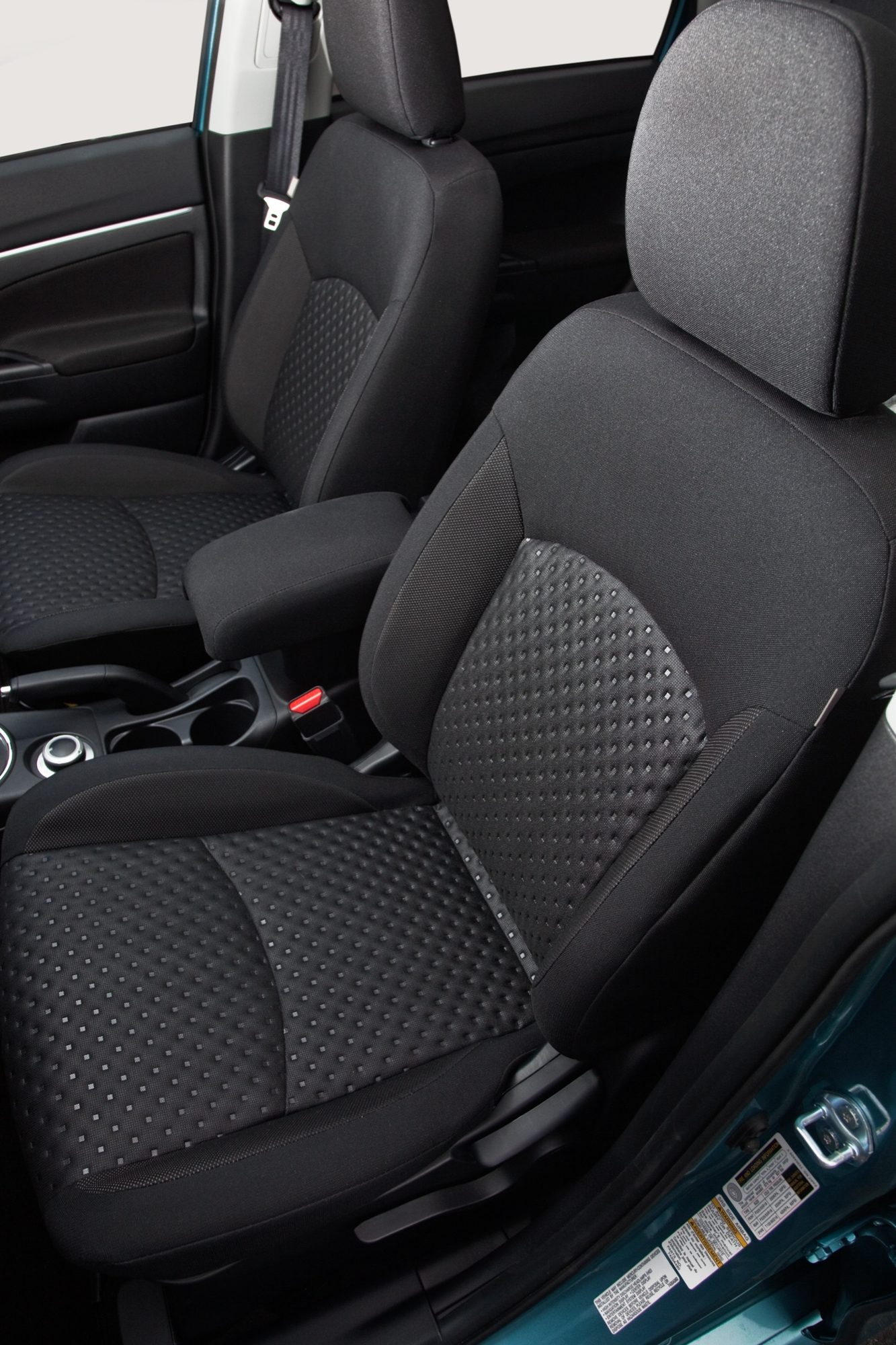 Black cloth front seats of the 2012 Mitsubishi Outlander Sport SE
