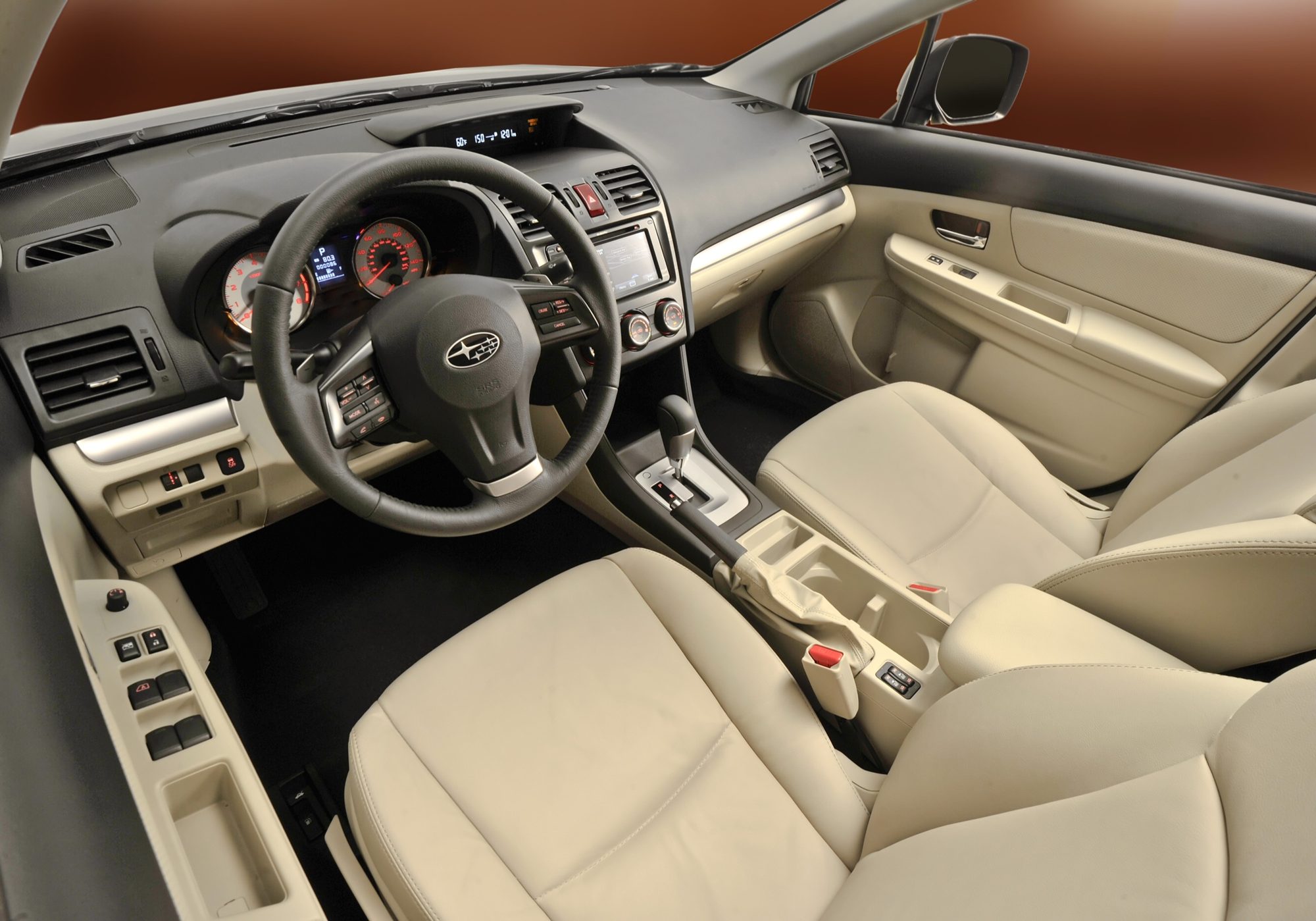 Ivory front seats and dashboard of the 2012 Subaru Impreza