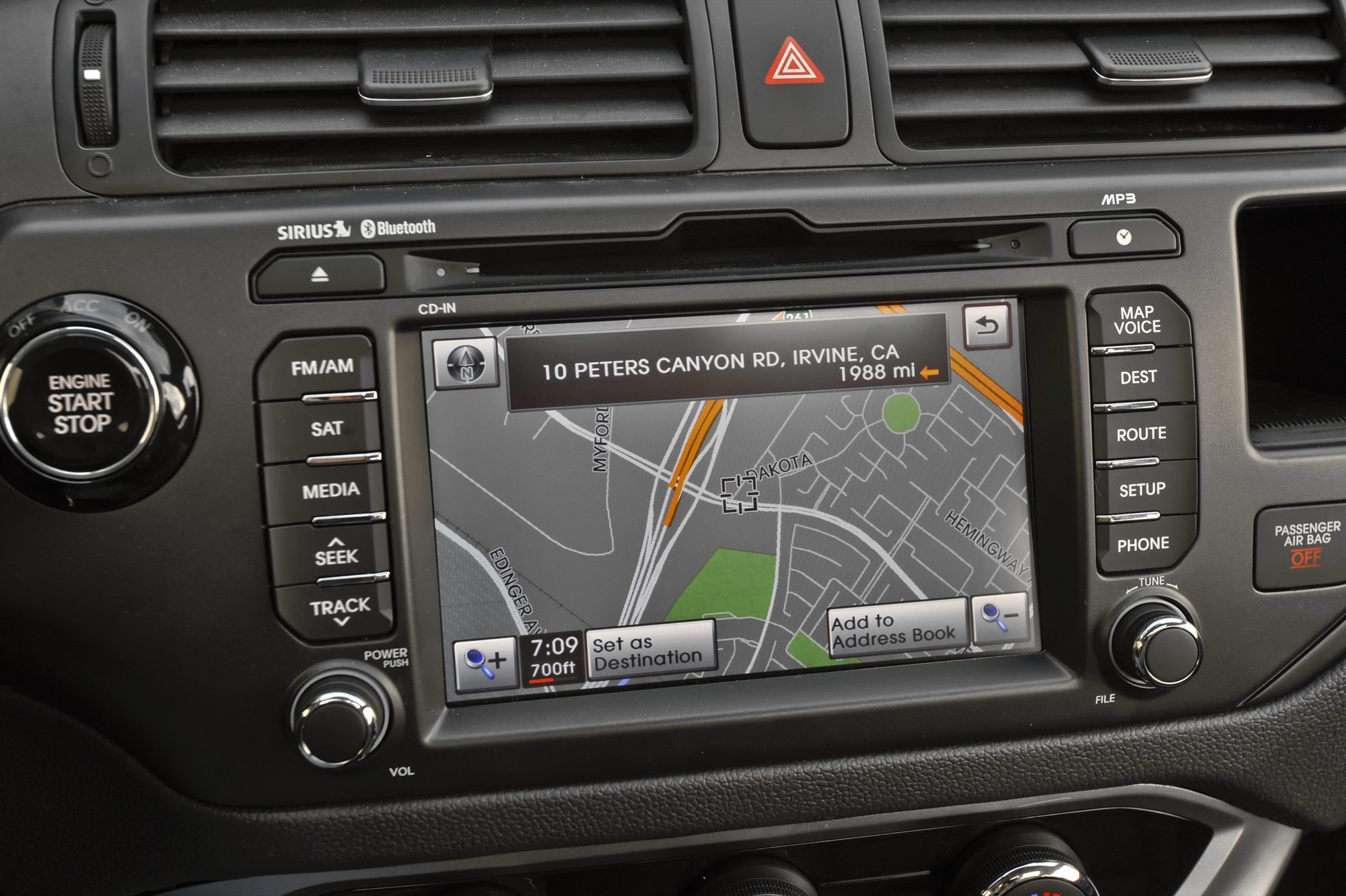 Navigation touchscreen and Engine Start/Stop button in the 2013 Kia Rio 5-door