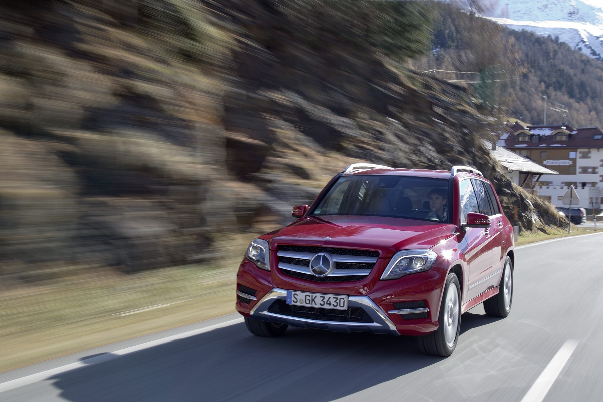 Front of a red 2013 Mercedes-Benz GLK350 4MATIC on a mountain road