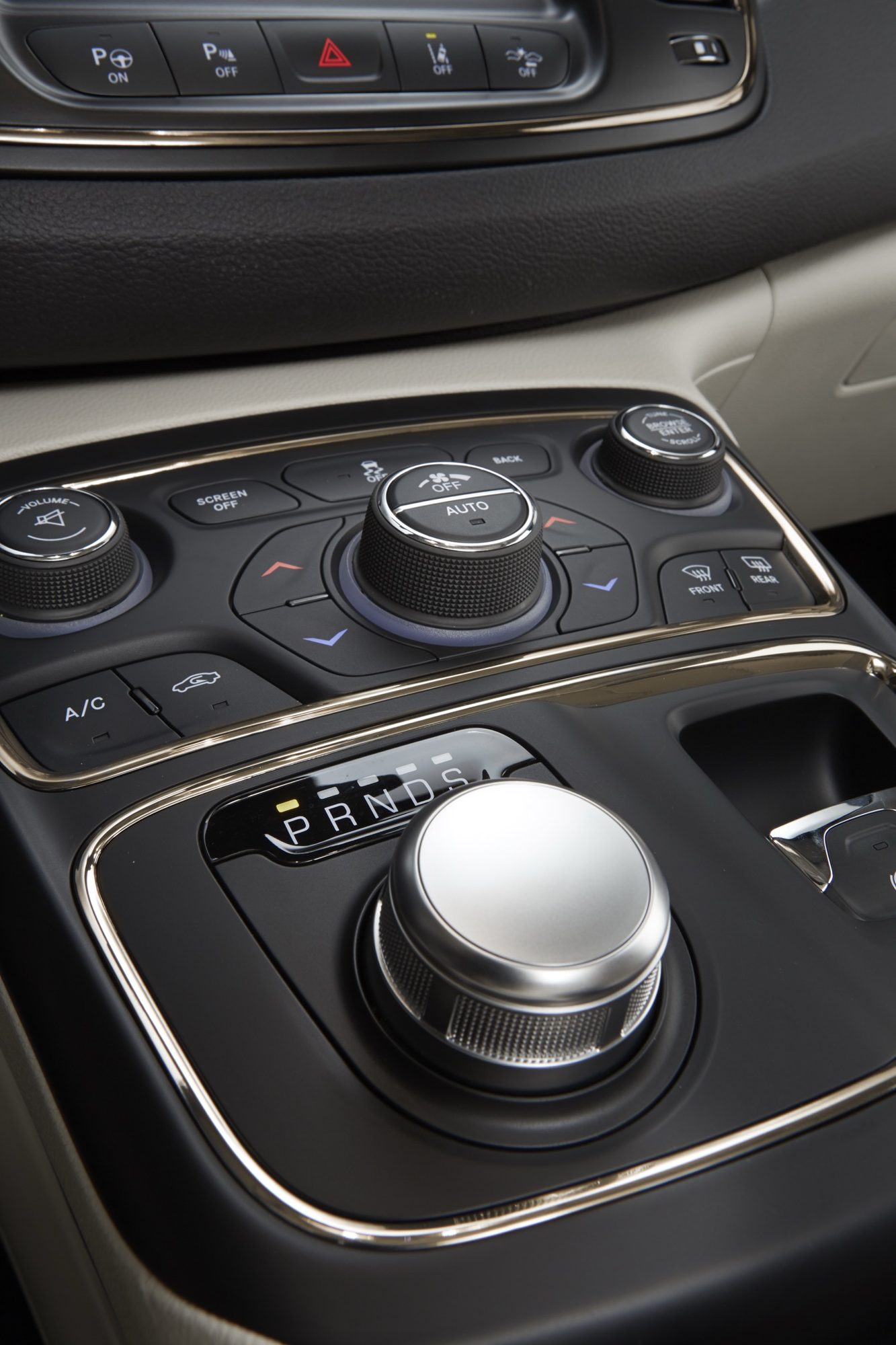 Rotary dial gear selector and climate controls on the center console of the 2015 Chrysler 200C